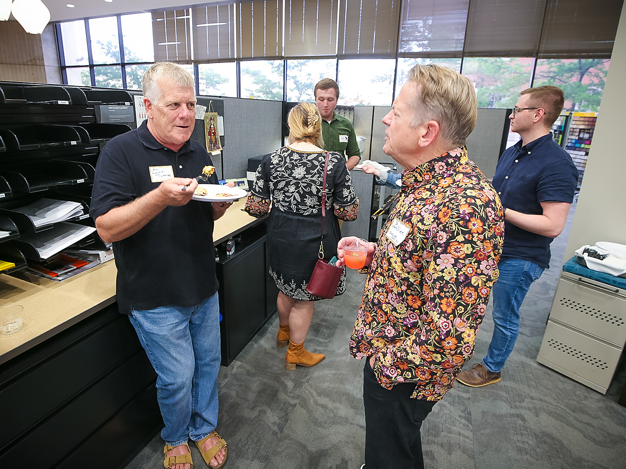 Networking among guests at the Wichita Magis Puppy Event