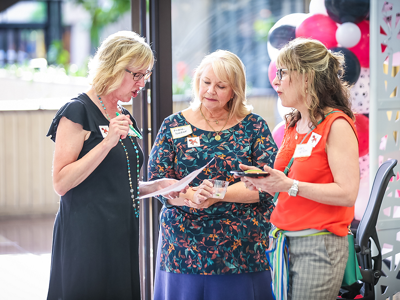 Account Manager/A&D Rep, Laura Tuttle, greets guests and discusses the evening's agenda