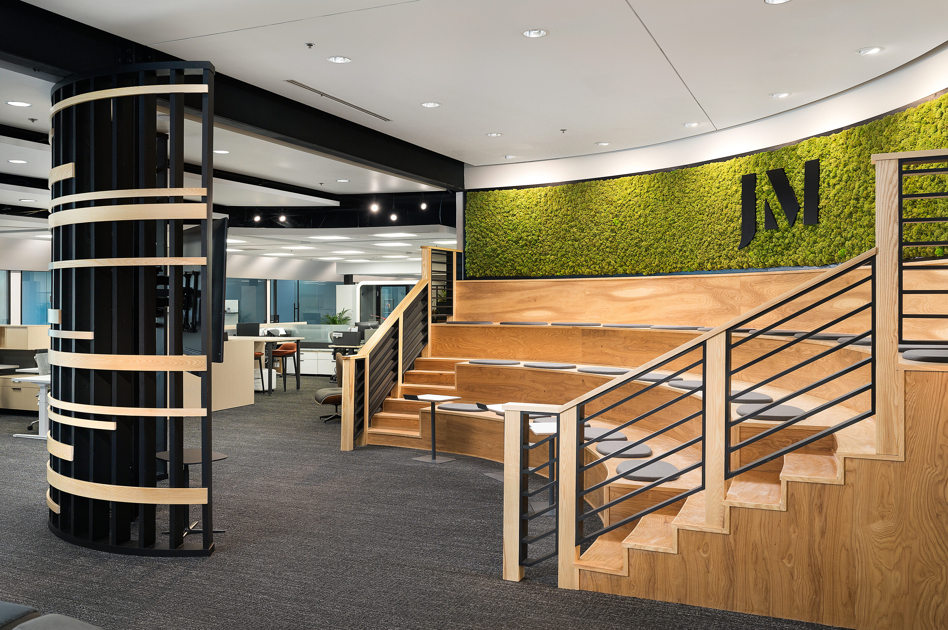 Amphitheater seating area with moss wall